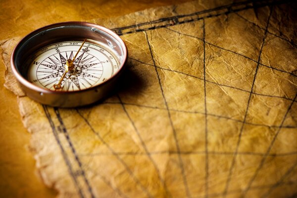 Vintage compass on the map