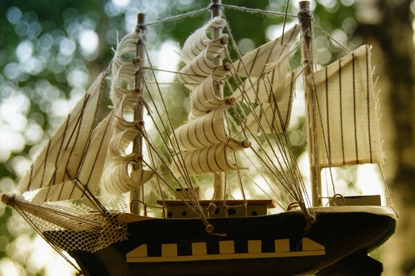 Statuette model of a ship with sails