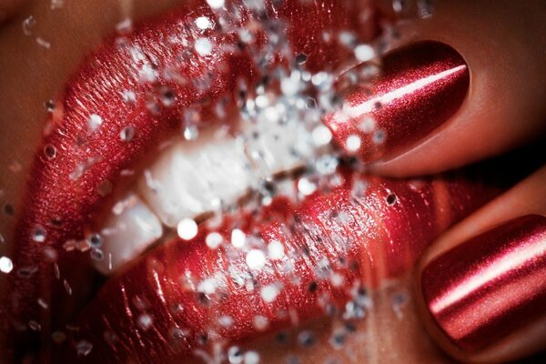 Red glamorous lips and nails