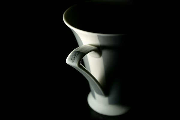 Stylish photo of a cup in black tones