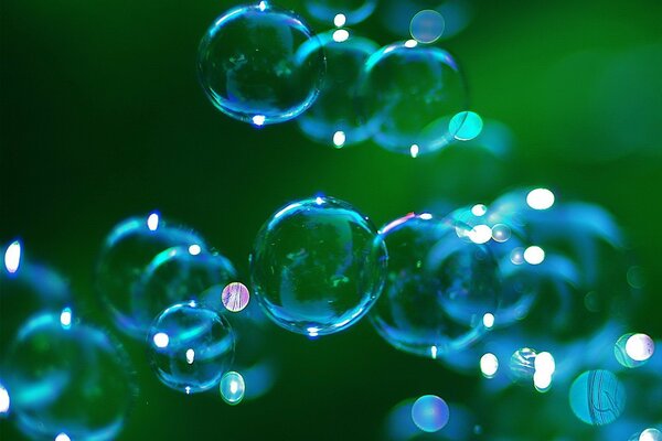 Blue bubbles on a green background