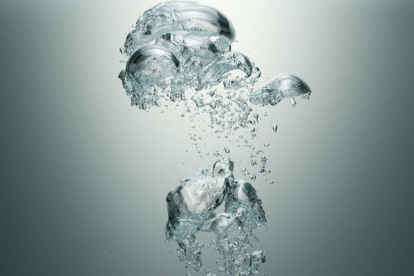 Bubbles in the water on a gray background