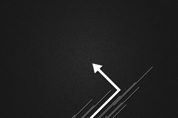 On a dark background, a corner arrow