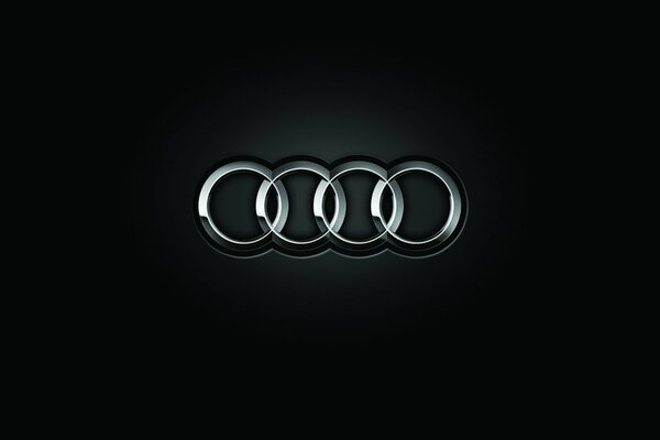 Audi-Logo auf schwarzem Hintergrund