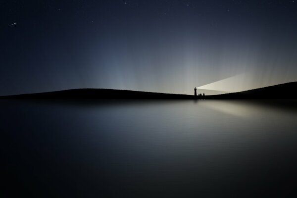 Night landscape. Lighthouse in the middle of the water