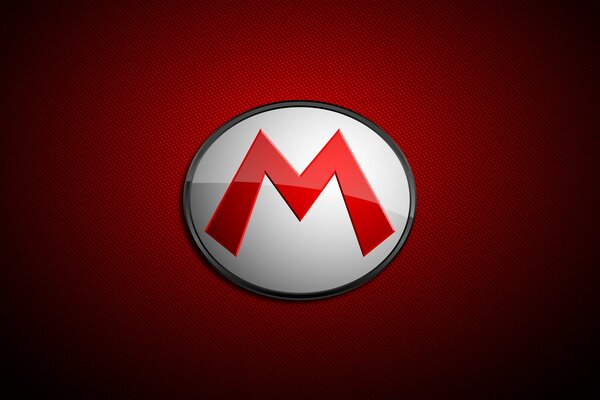 Round m emblem on a red background