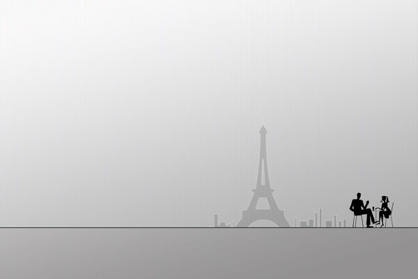 A COUPLE IN LOVE AT THE TABLE. DRAWING OF THE EIFFEL TOWER ON A GRAY BACKGROUND