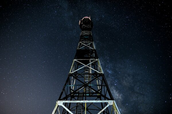 Metal tower on the Milky Way background