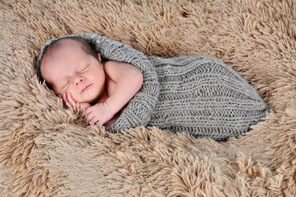 The first photos of a child on a warm background