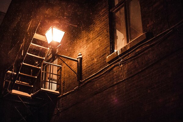 Beautiful location of a brick building with a bright lantern