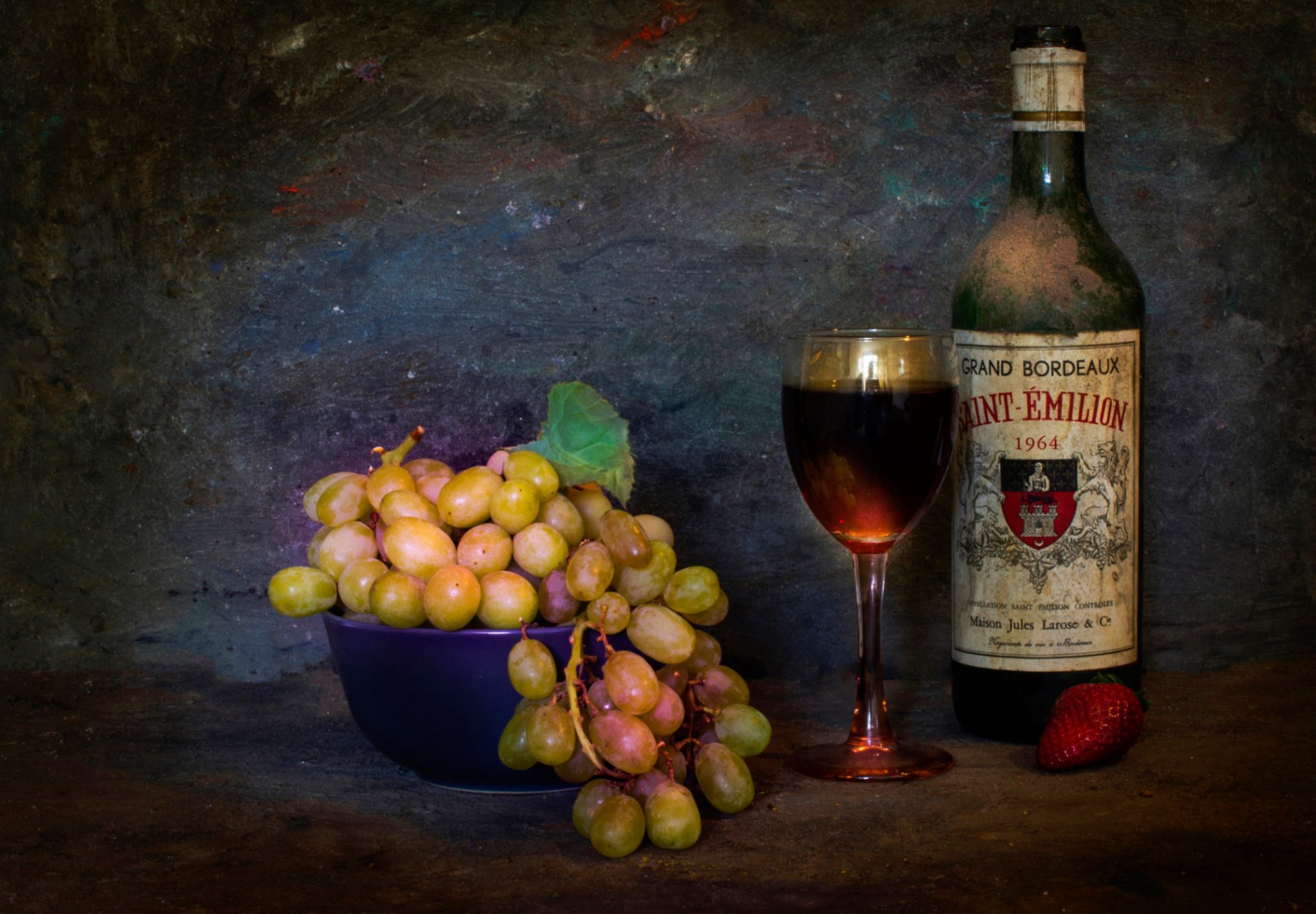 vinum essentia est vitae grapes bunch of a bottle glass still life