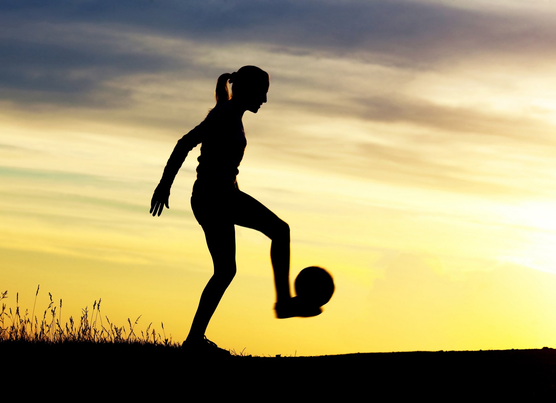 ilhouette man morning dynamic warm-up football professional freestyle athlete chasing juggling ball nature dawn beautiful background wallpaper
