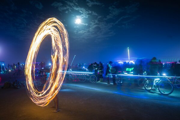 Fire show under blue lights