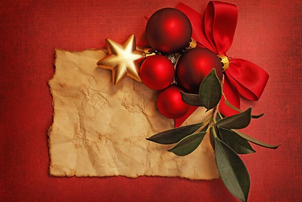 Bolas rojas de Navidad con arco y estrella