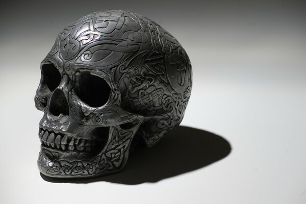 Skull with shadow patterns on a white background