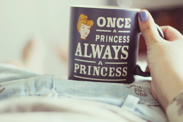Purple mug with an inscription in English