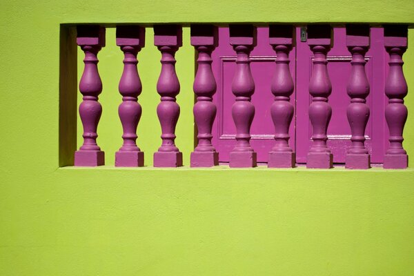 Green background and eggplant balusters