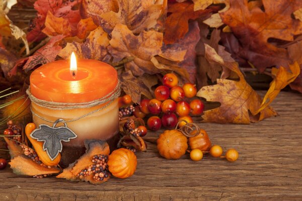 Autumn leaves are falling candles are burning