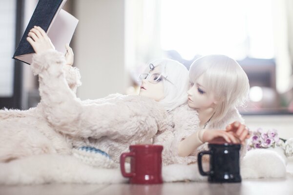Realistic dolls with white hair