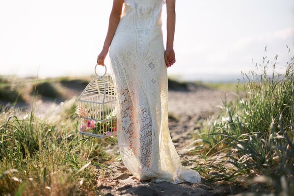 A girl in a wedding dress from the back