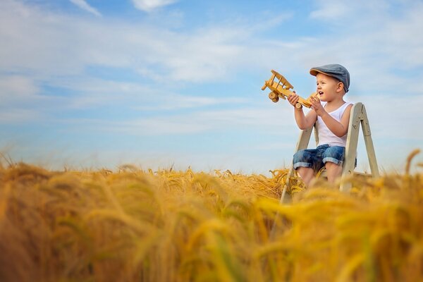 A spiky field embraces a boy playing