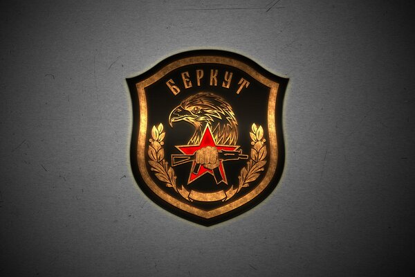 The emblem of the Berkut power unit on a wide-format full-screen wallpaper