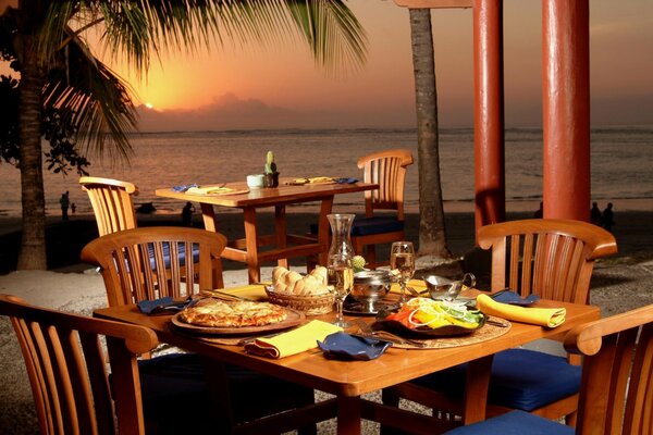 Evening dinner at an oceanfront restaurant