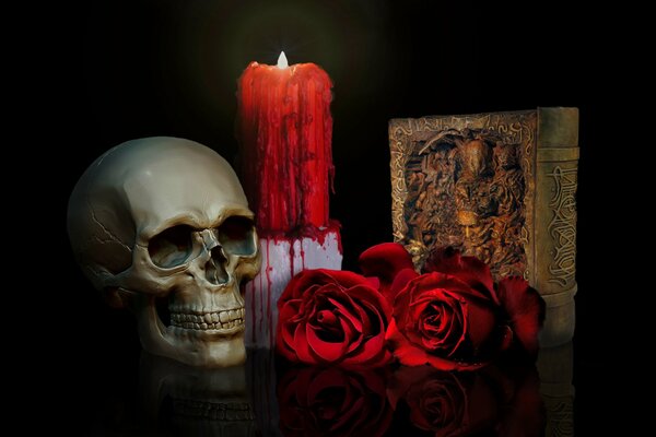Schädel mit Rosen auf dem Hintergrund eines Buches und einer Kerze