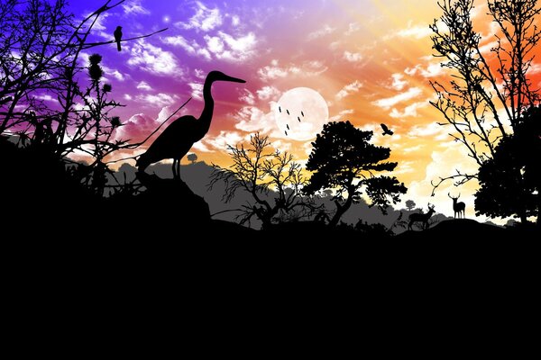 Animales en el fondo de una brillante puesta de sol