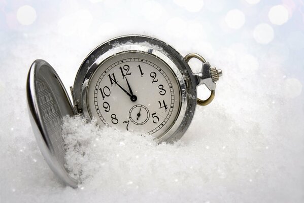 The picture is the clock on without 5 12 in the snow