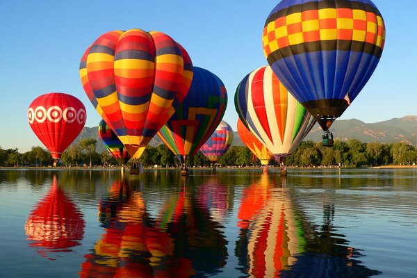 Hot air balloon flights over the surface of the lake