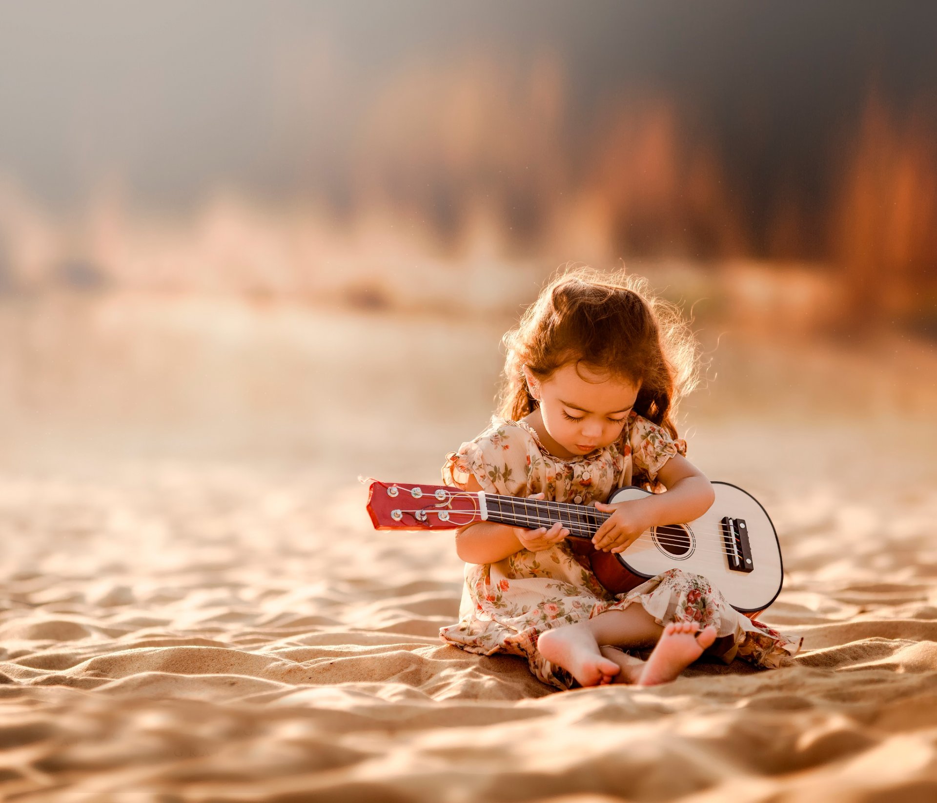 mélodies du cœur fille guitare sable