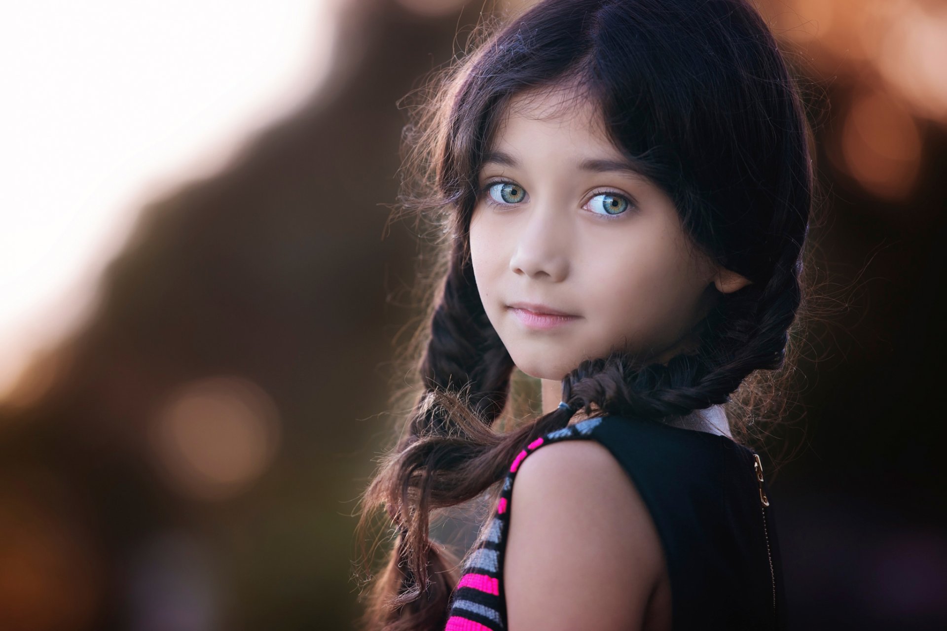 fille tresses portrait bokeh