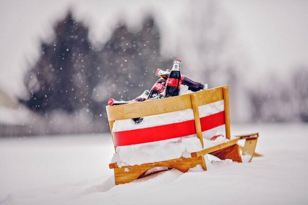 Bild auf Sonja im Winter fährt Coca-Cola