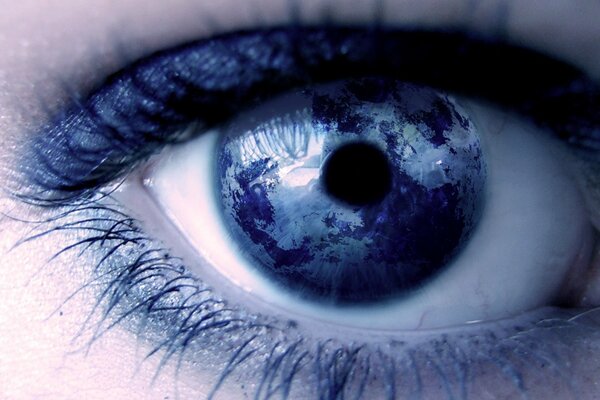 Auge mit Wimpern. Pupillen Planet