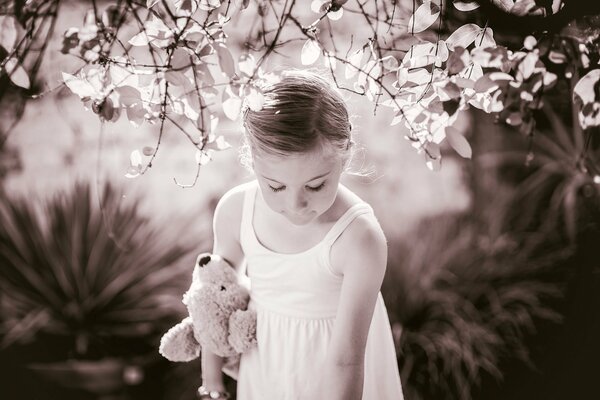 Vintage picture of a girl with a toy