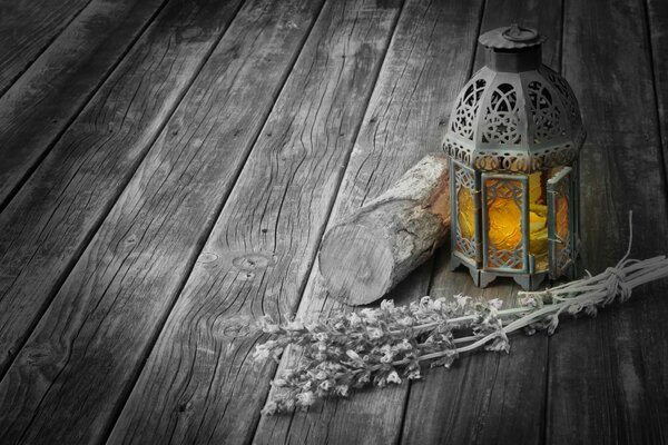 Background with lavender and candle on a wooden table