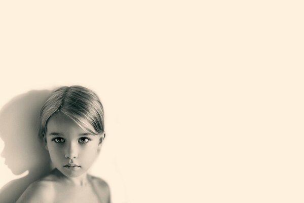 Portrait of a girl on a solid background