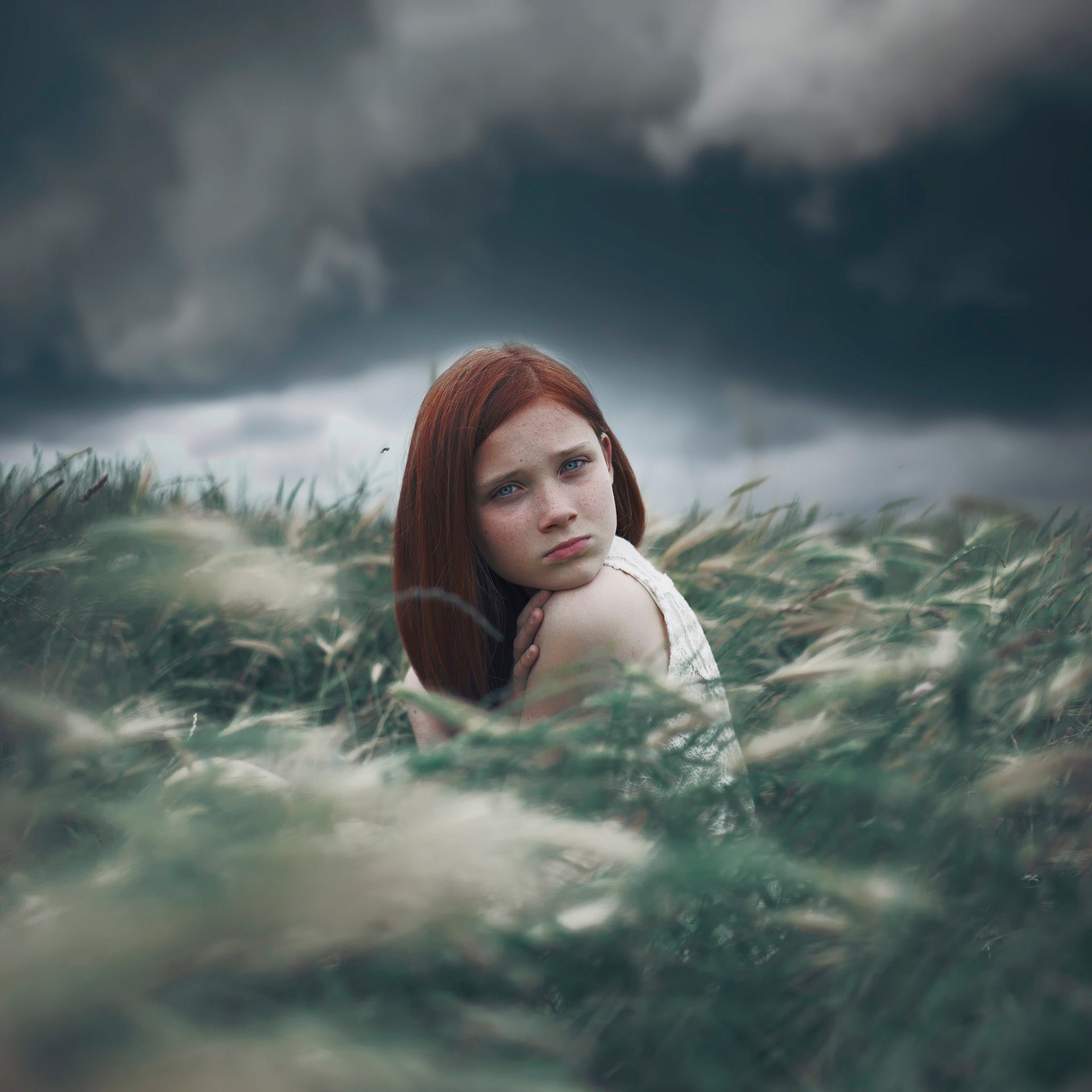 girl red hair freckles view nature