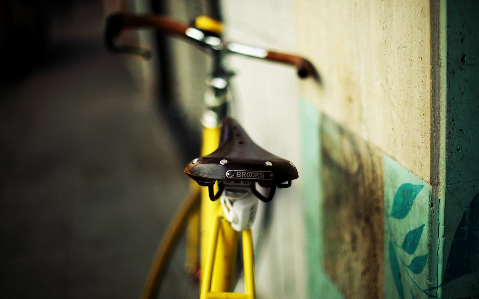 miscellaneous bike bicycle seat yellow blur sports macro background wall town wallpaper widescreen full screen hd wallpapers fullscreen