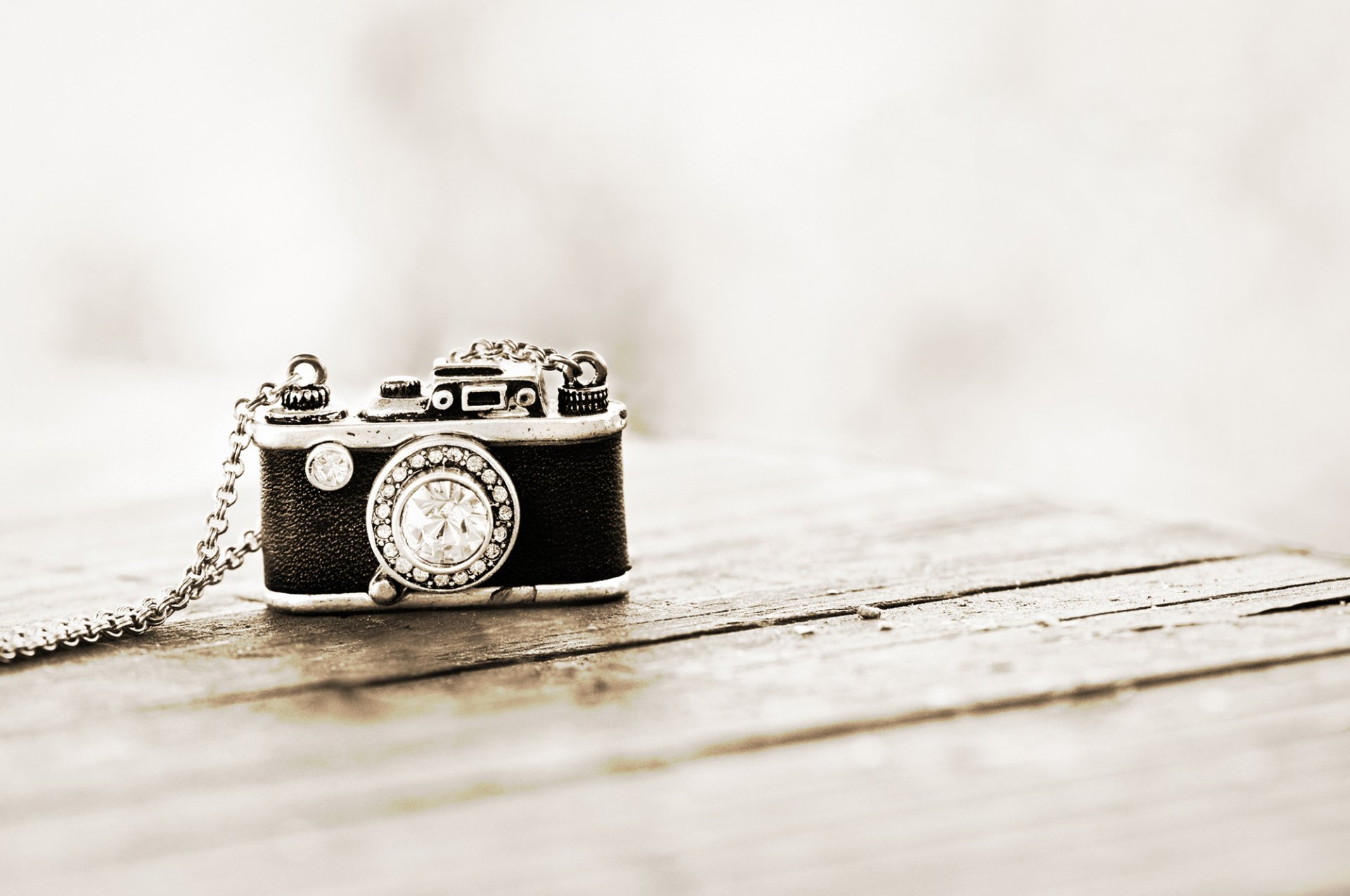 a camera stone string pendant suspension background