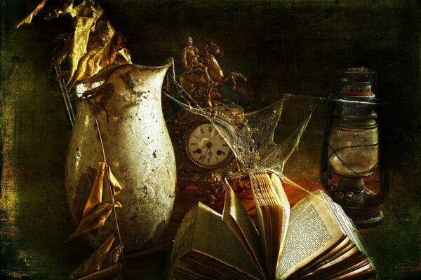 Beautiful antique still life with a lantern and a book