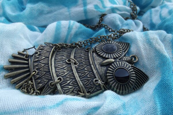 A chain in the form of an owl is a beautiful amulet