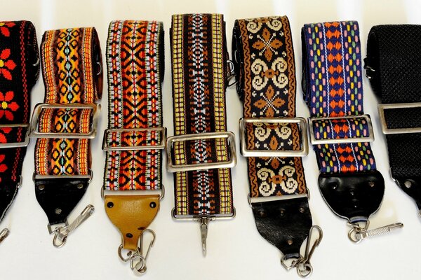 Various belts embroidered with carabiners