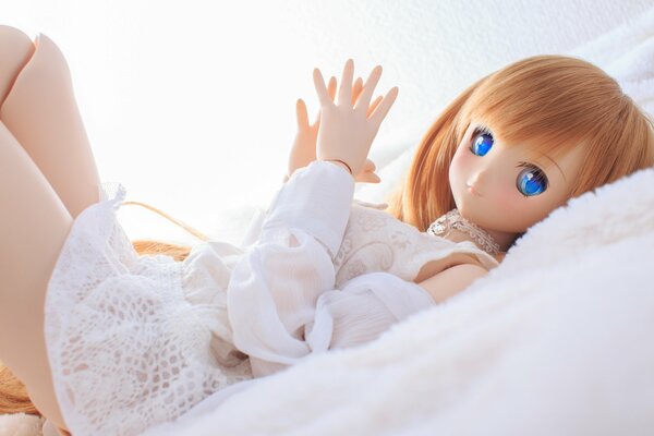 A mobile doll with blue eyes