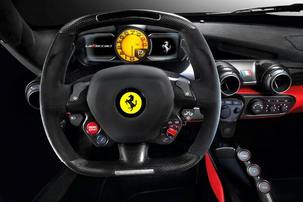 Pannello di controllo con volante per auto ferrari