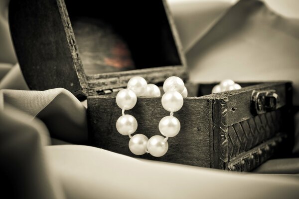 White pearl beads in a chest