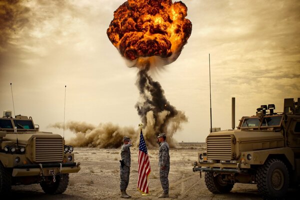 Two American soldiers next to a flag on the background of an explosion