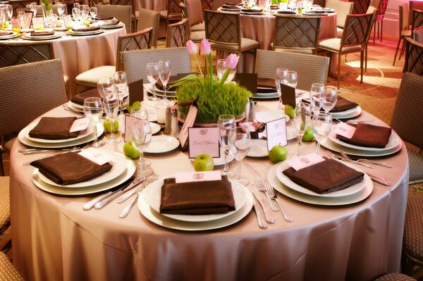 Table setting in a restaurant made of black napkins