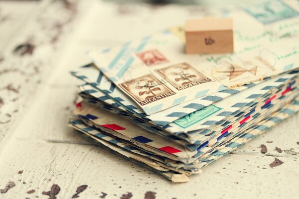 Envelopes with letters from Argentina are on the table